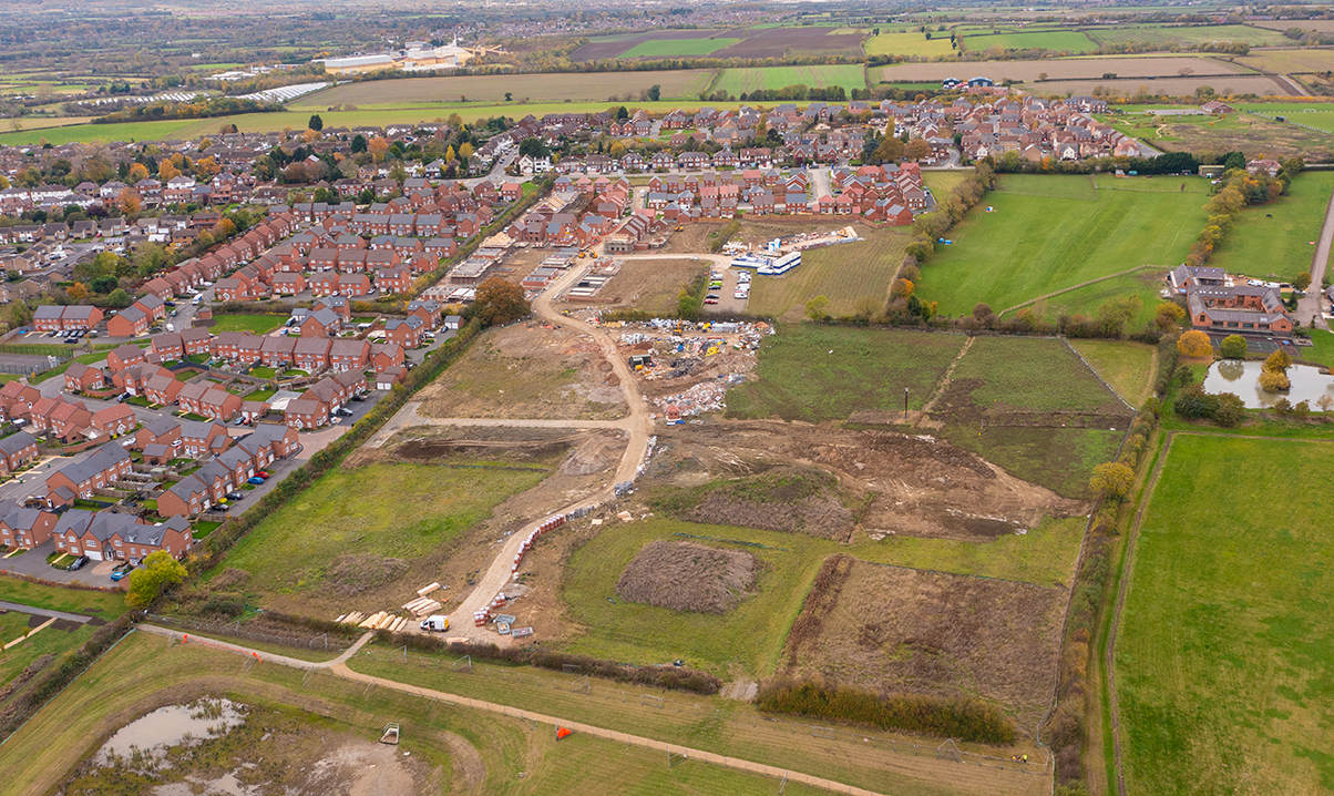 Strategic land being built on and converted into new homes. Aerial view.