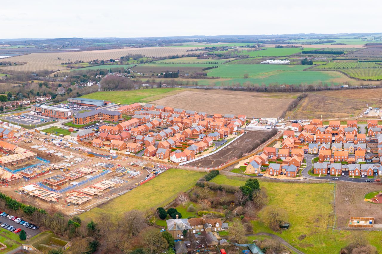 Development of new homes and a care home in Faversham on land promoted by Hallam Land. Aerial.