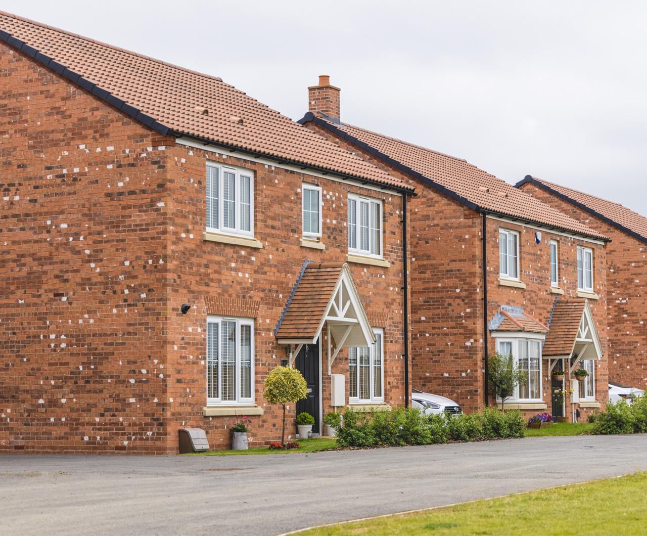 Row of new build brick houses.