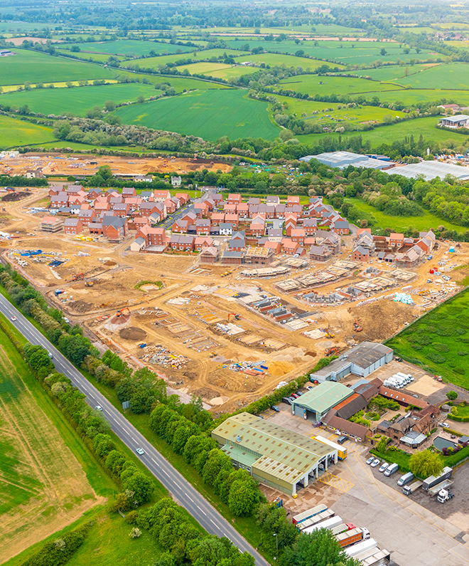 Strategic land with planning permission being developed. Aerial view.